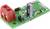 A green electronic circuit board with multiple coloured resistors, a capacitor, a black diode, and a red terminal block.