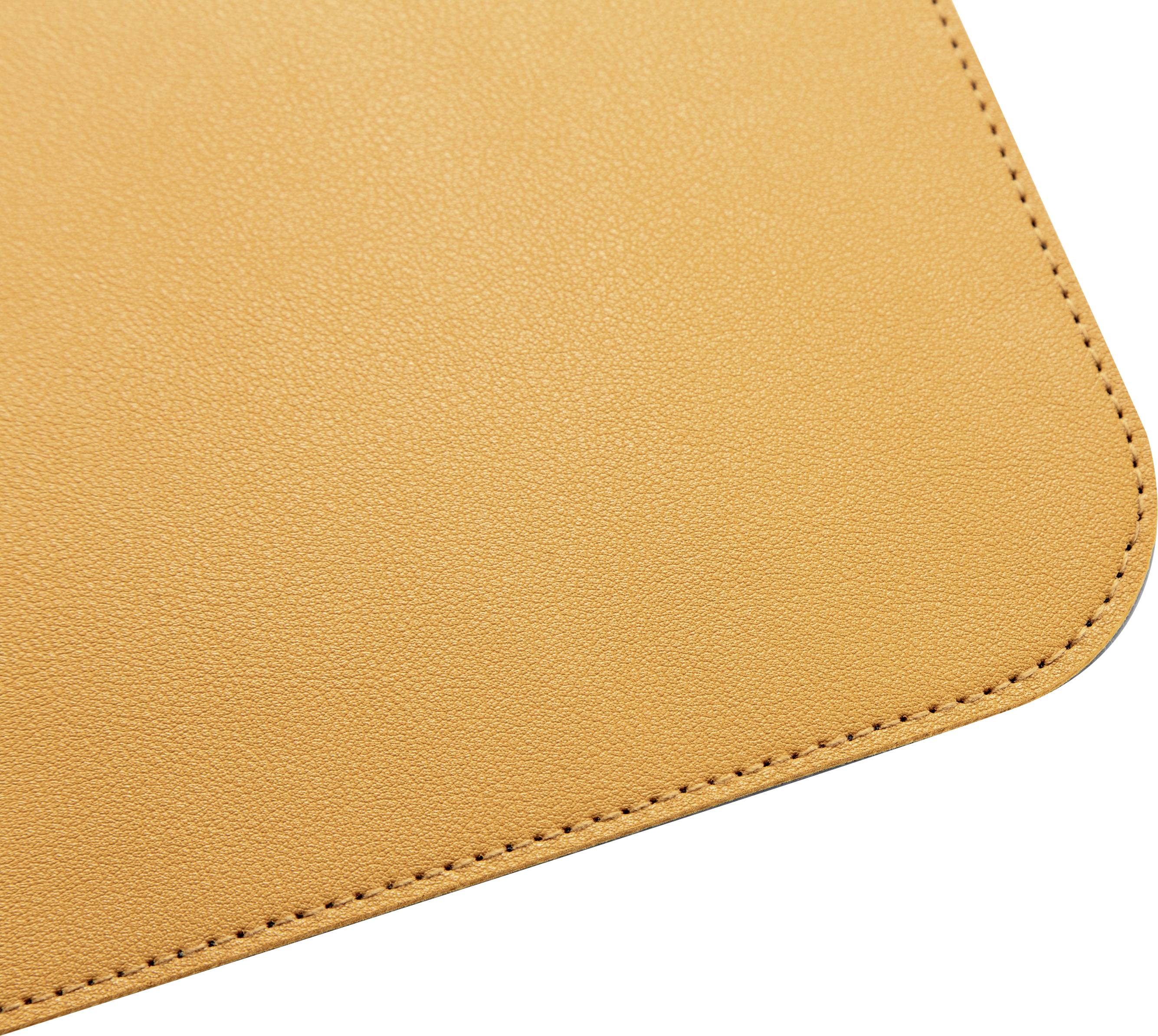 Brown leather mat with quilted edge, glossy surface.