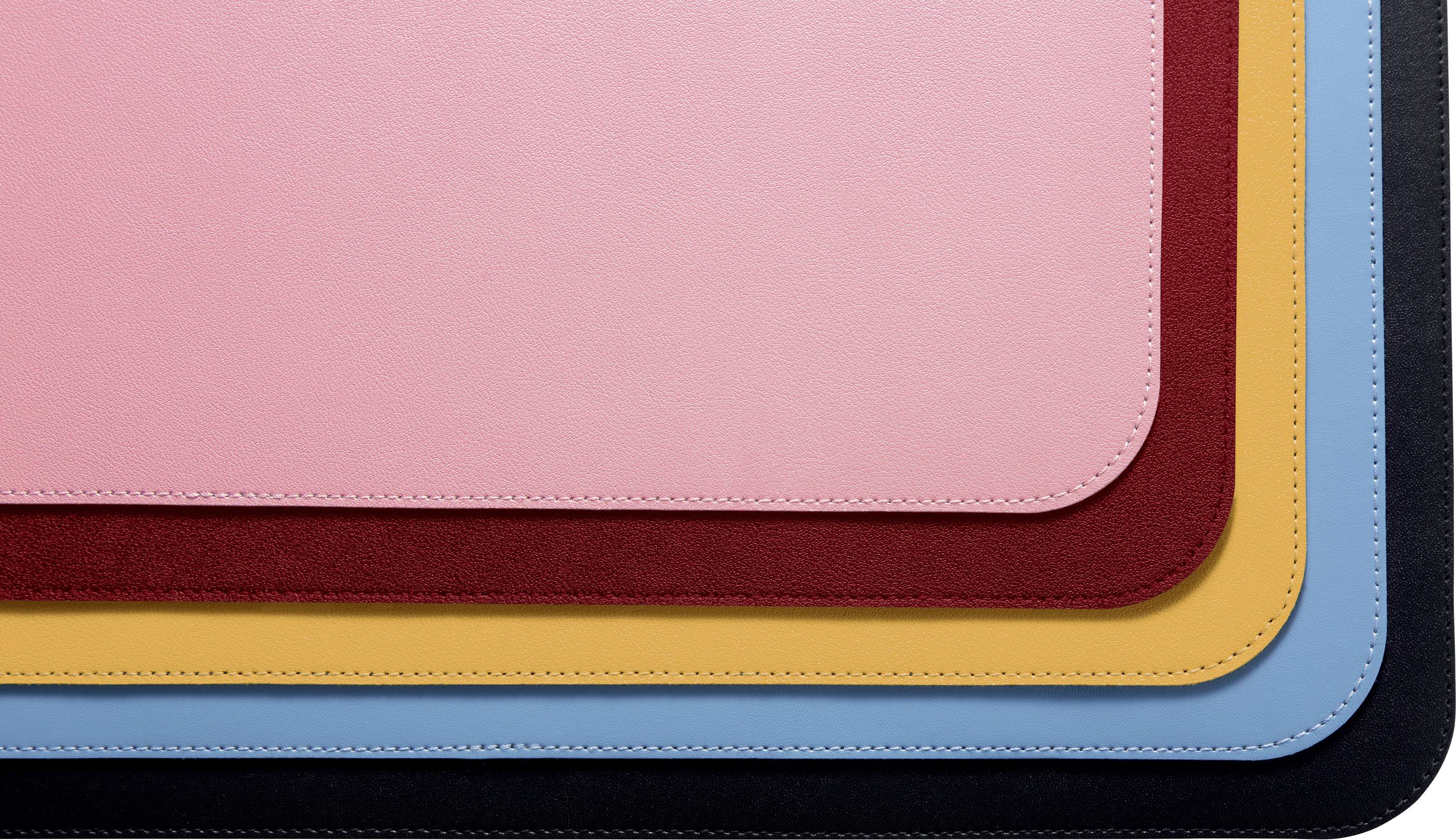 'Five overlapping placemats in various colours: Pink, dark red, yellow, blue and black, demonstrating a variety of options and styles.'