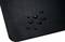 A black surface with several water droplets visible on the material indicates water repellence.