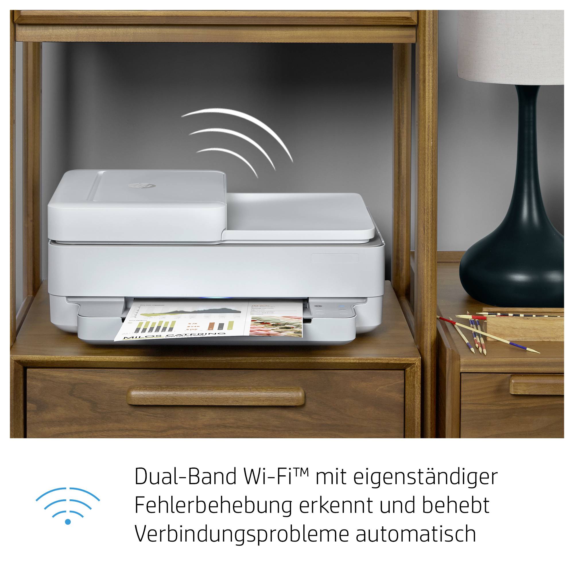 A printer on a wooden table automatically recognises and resolves connection issues thanks to dual-band Wi-Fi with error correction.