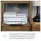 A printer on a wooden table automatically recognises and resolves connection issues thanks to dual-band Wi-Fi with error correction.
