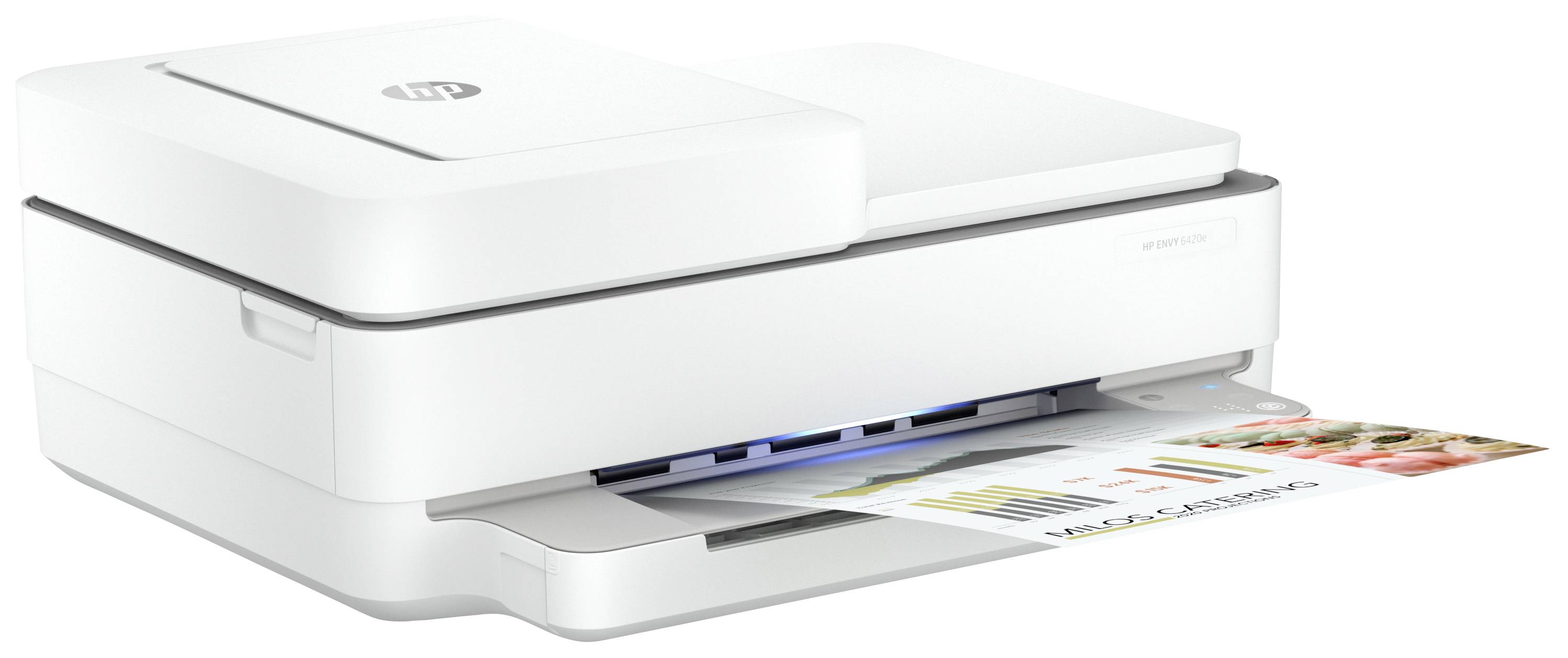 A white printer is printing a coloured document with diagrams and images. The printer has a slim design.