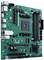 Green circuit board with various chips, slots, and connectors, typical of a motherboard for desktop computer hardware.