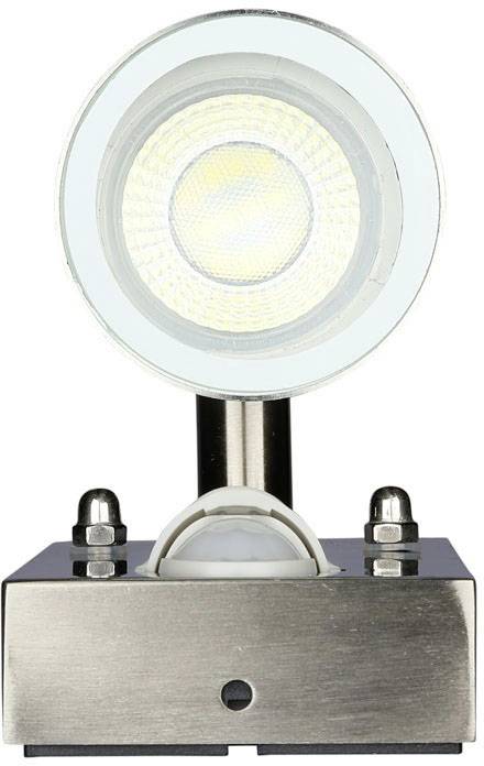 Round LED spotlight with silver housing and matte base, shining brightly forward. Suitable for interior lighting.