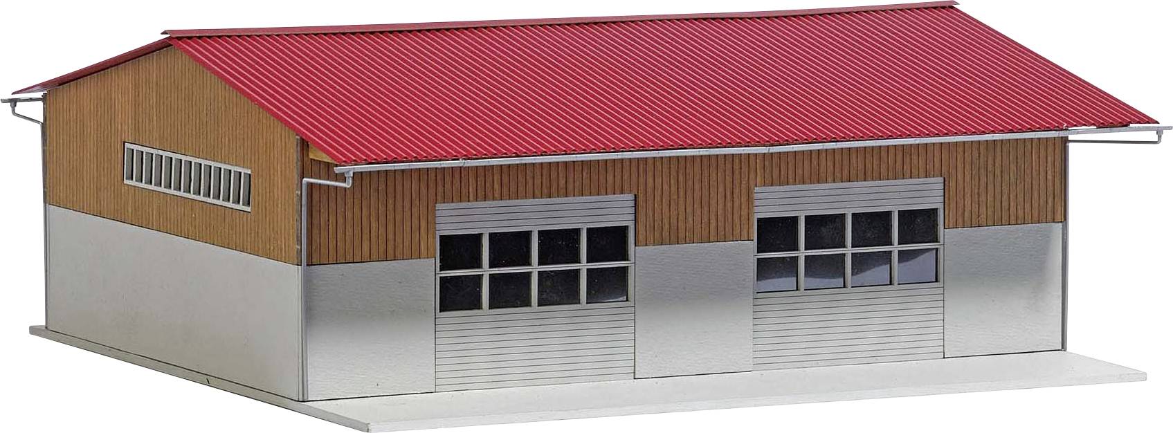 A model of an industrial building with a red roof, two large roller shutters and wooden cladding on the sides.