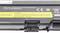 A laptop battery with a label displaying model numbers and specifications, along with a warning about heat and fire.