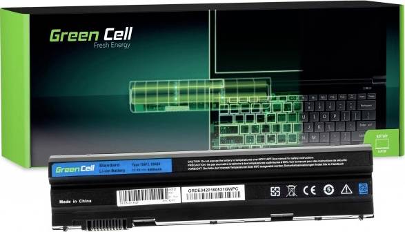 Laptop replacement battery from 'Green Cell' with packaging, model and compatibility details visible. Supports various laptop models.
