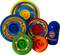Colourful, circular toy rotors in various sizes and colours, arranged beside a cylindrical throwing game.