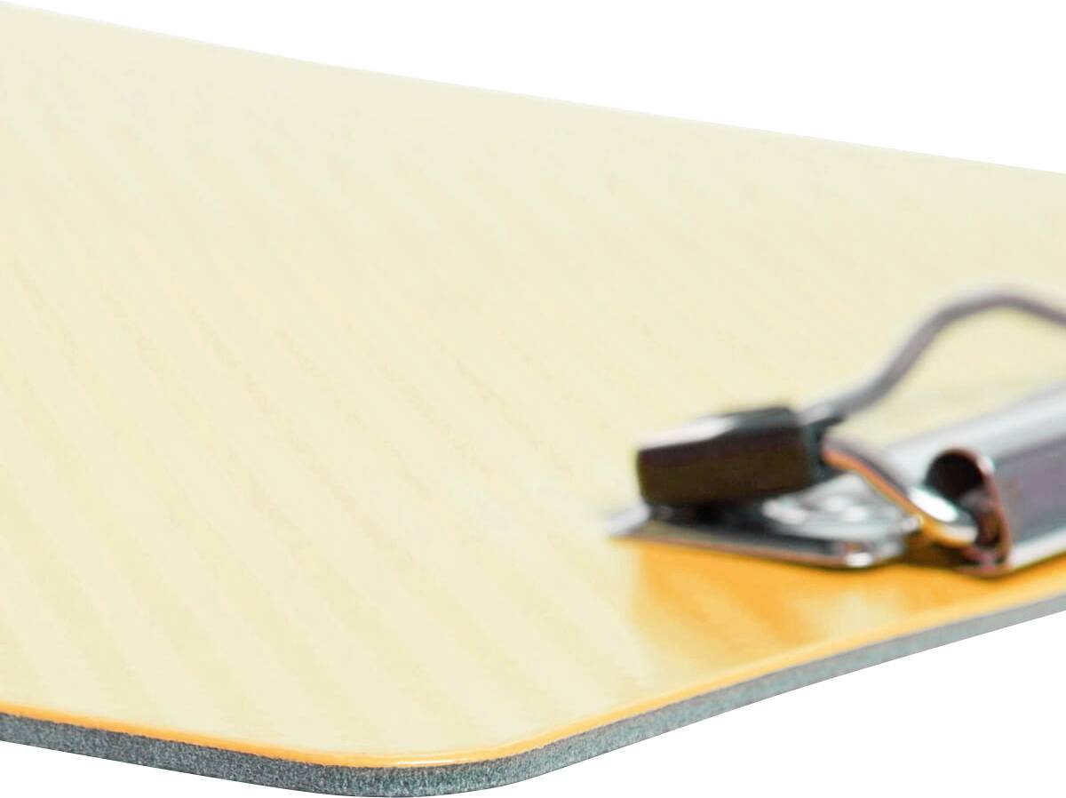 Close-up of a yellow clipboard with a metal clip.
