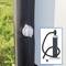 An inflated valve on a black vertical surface with an inset image of a hand pump complete with hose and nozzle.