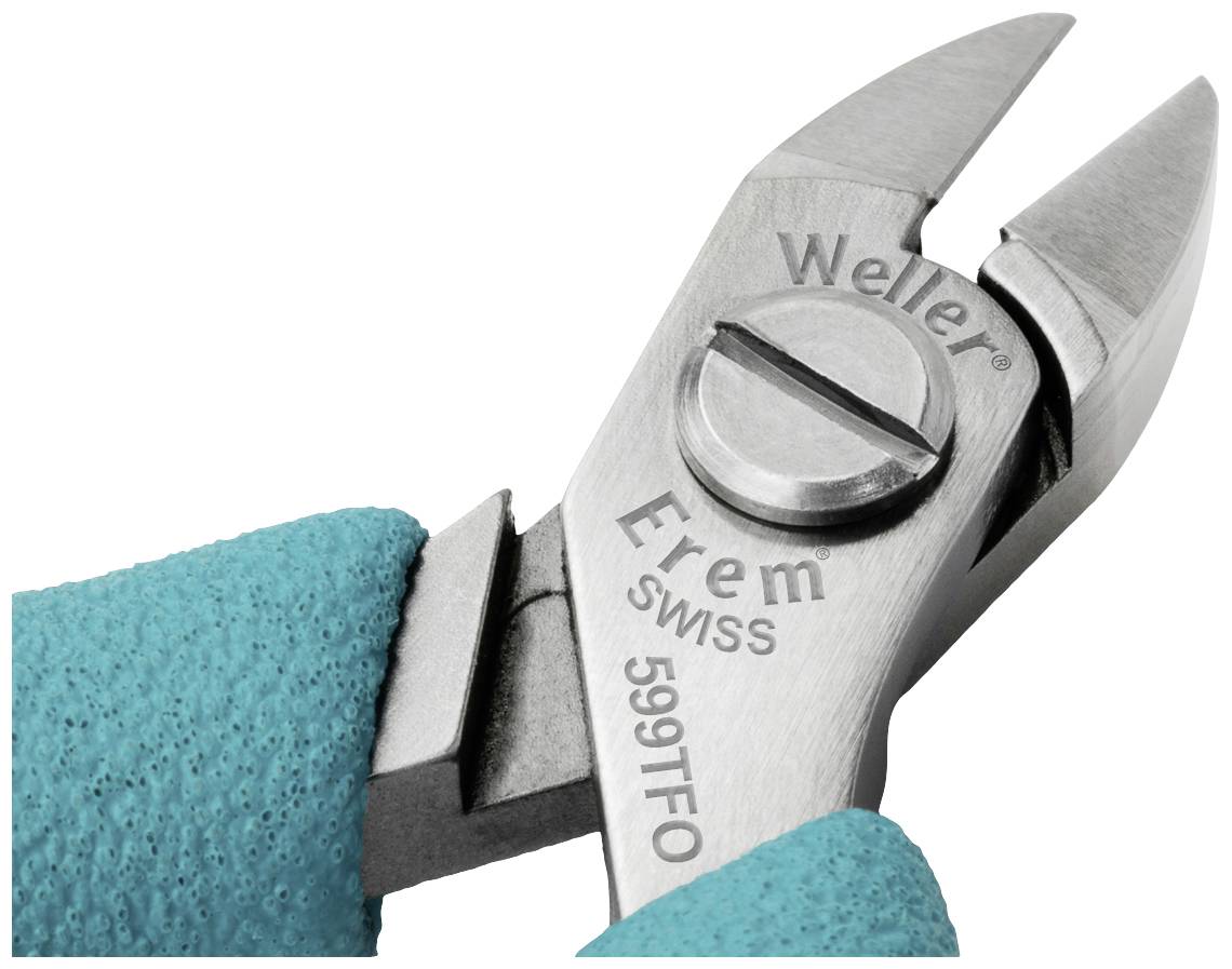 A person is holding an Erem precision side cutter with turquoise handles. The pliers are marked with 'Weller Erem Swiss'.