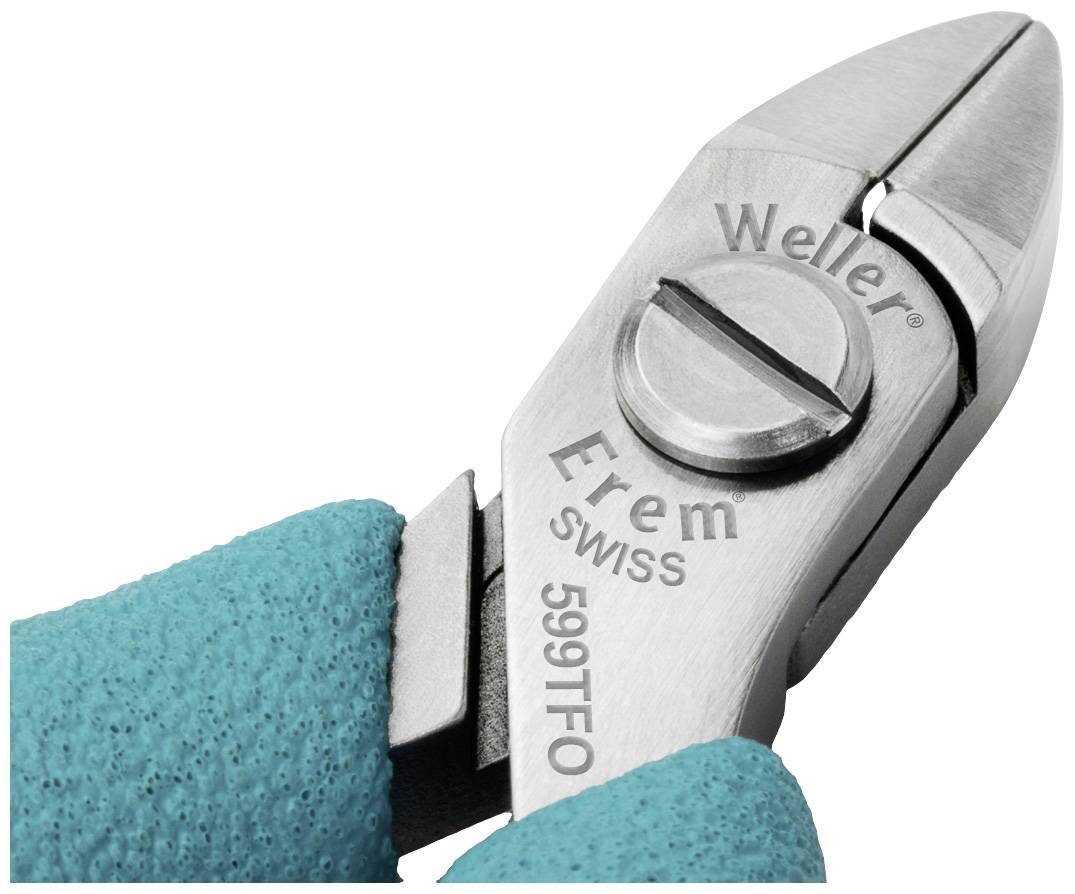 Close-up of a Weller Erem precision pliers in a hand. The pliers are marked with the inscription 'SWISS 599TFO'.