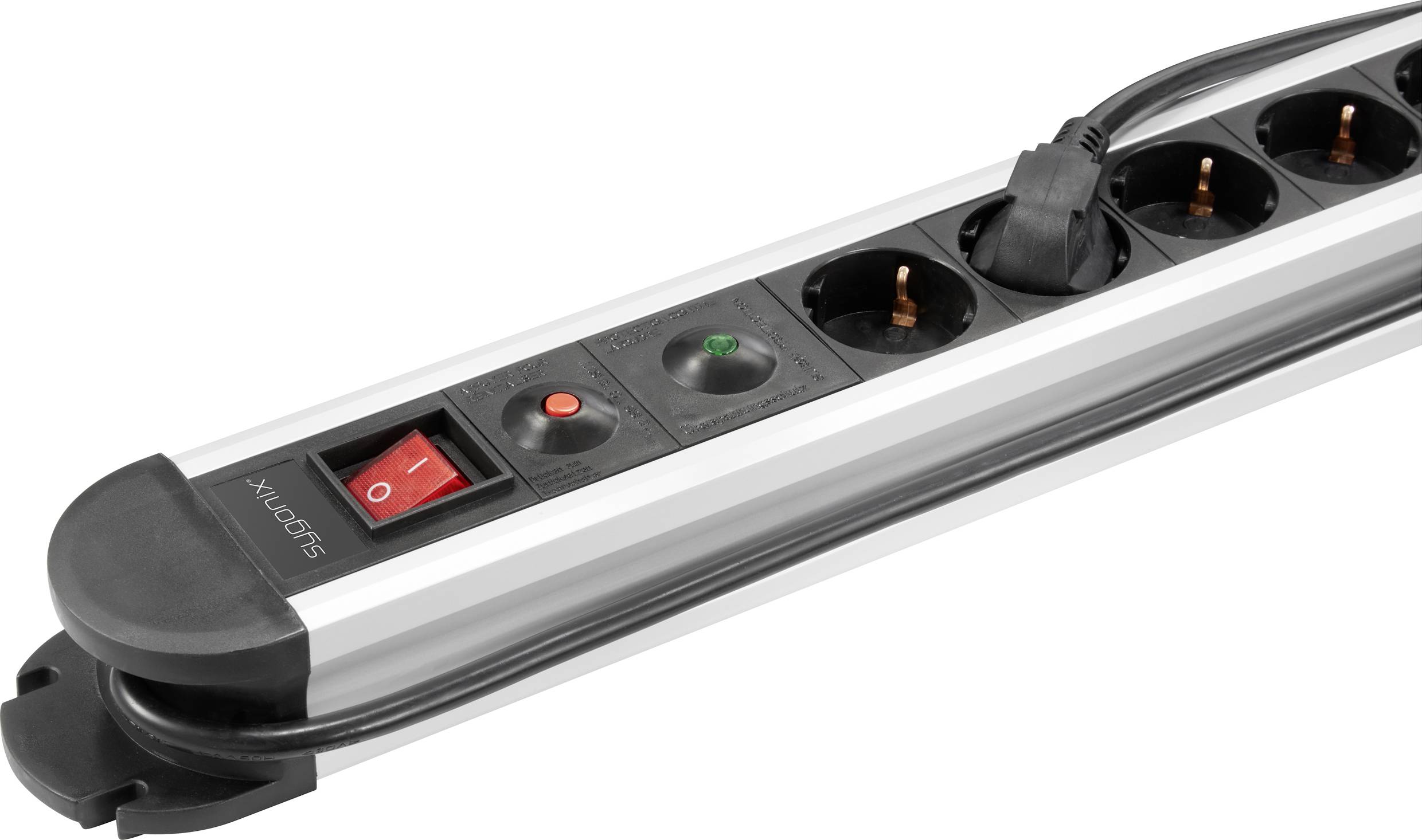 A silver extension socket strip with six Schuko sockets, a red power switch, and surge protection indicator.