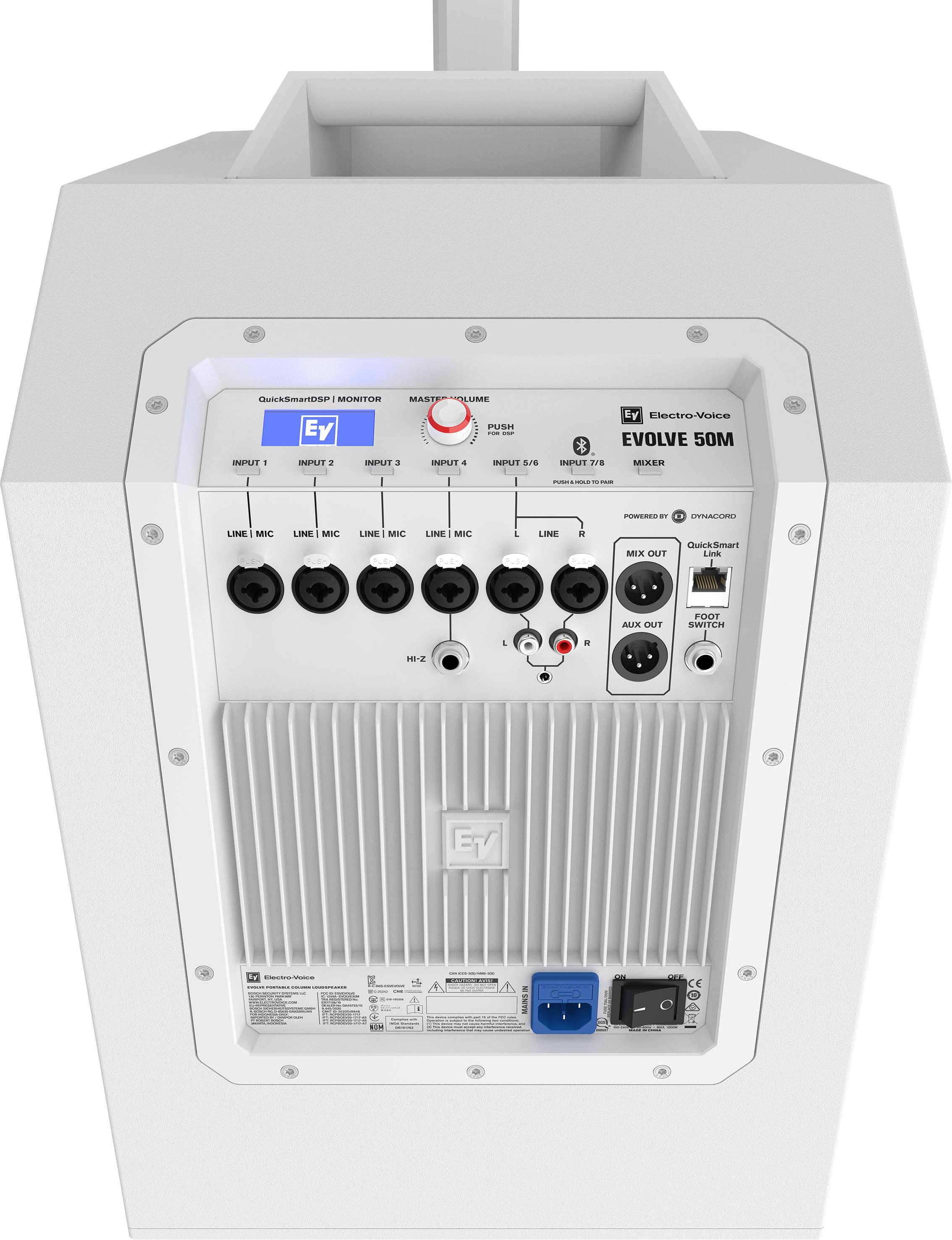 'EV Evolve 50M' speaker system from above, showing connections and controls, including rotary dials and audio inputs.