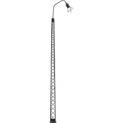 Street lamp with a slender, latticed column and two small, white lamp shades at the top end.