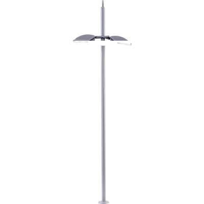 A modern, sleek standard lamp with two spread-out, rounded light shades on top, attached to a long metal pole.