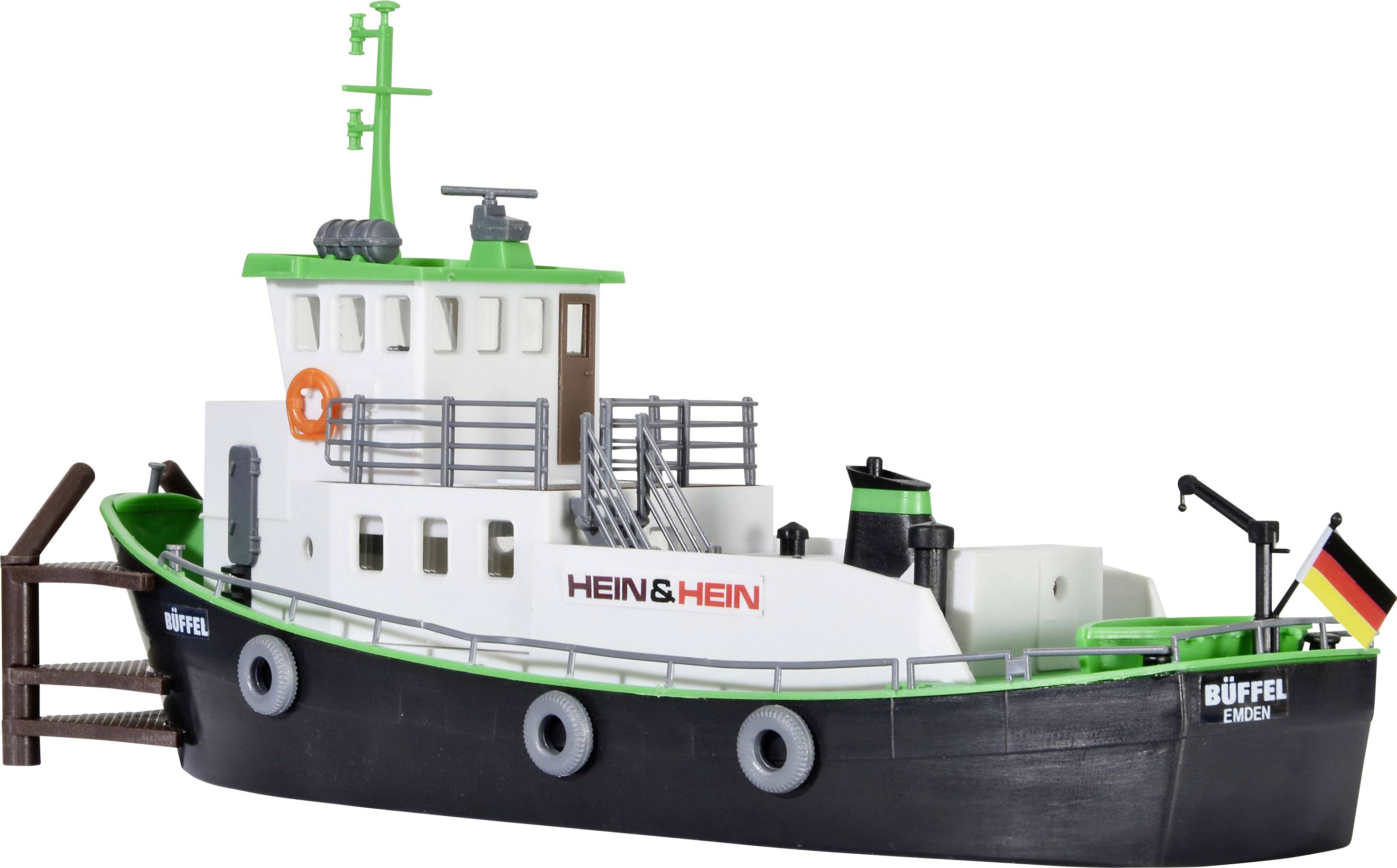 A model of a red and white ship named 'Büffel' with a German flag at the stern. The ship has a green mast.