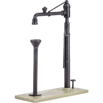 A model of a historical water pump with a long lever, mounted on a rectangular platform.