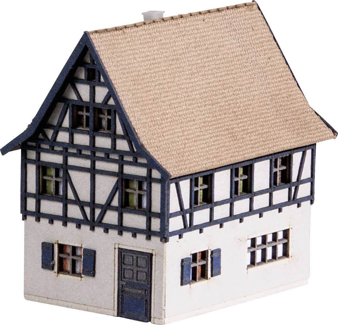 A small model of a half-timbered house with two storeys and a pitched roof, with a beige façade, blue windows, and doors.