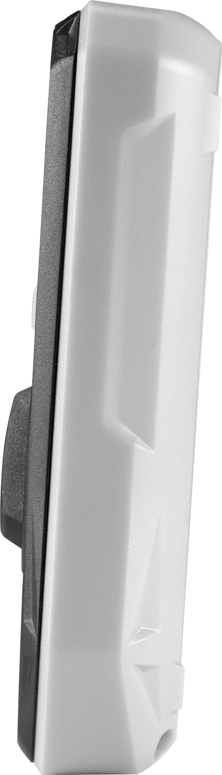 A white and black electronic device in side profile; details and purpose are not discernible.
