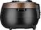 Black-brown rice cooker with a round design, side handle, and distance measurement lines on the side.