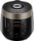 Electric rice cooker with digital display showing '12:00'. Various setting symbols and functions on the front panel.