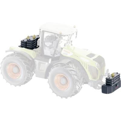 Tractor with two weight elements for ballasting. One is mounted at the front, the other on the rear section.