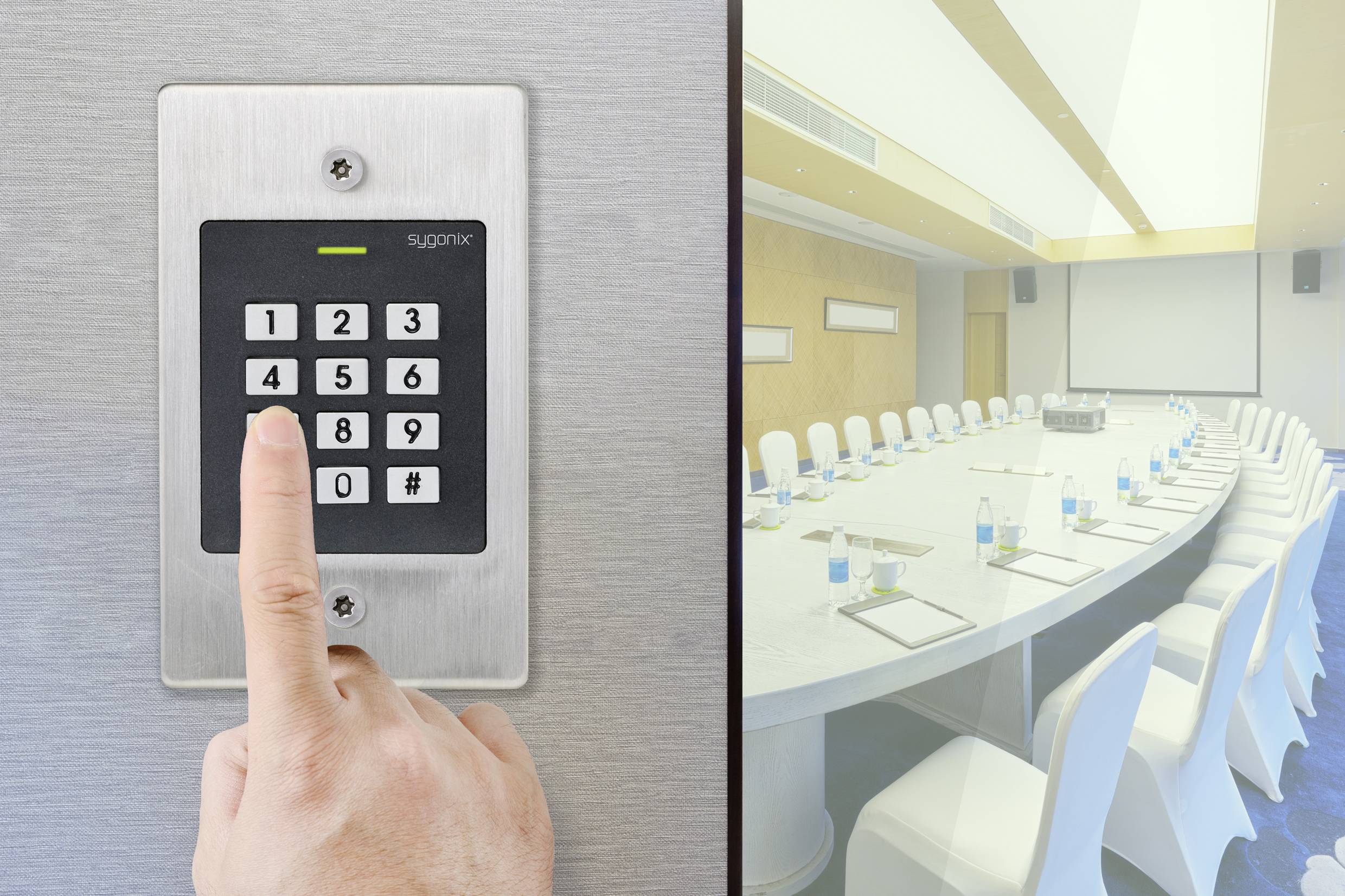 'A person enters a code into a numeric keypad to access a conference room with a long white table and chairs.'