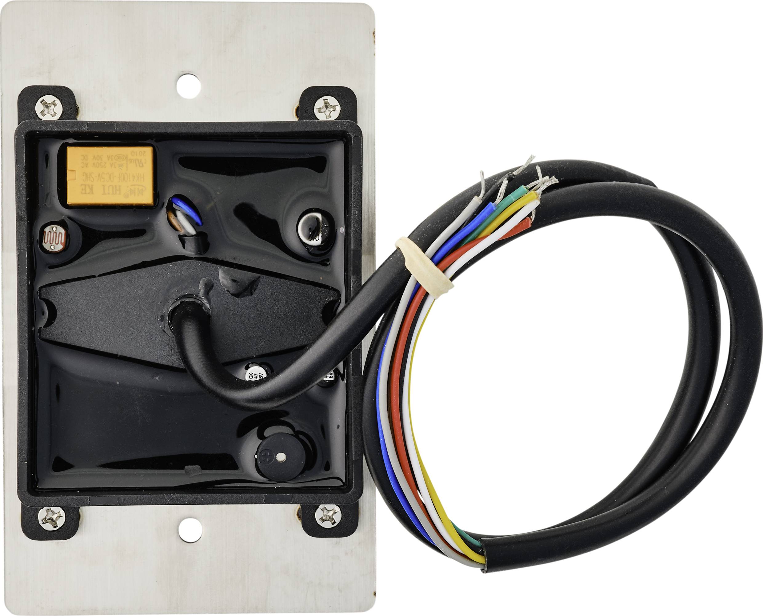 An electrical component with several colourful cables, secured to a metal plate.