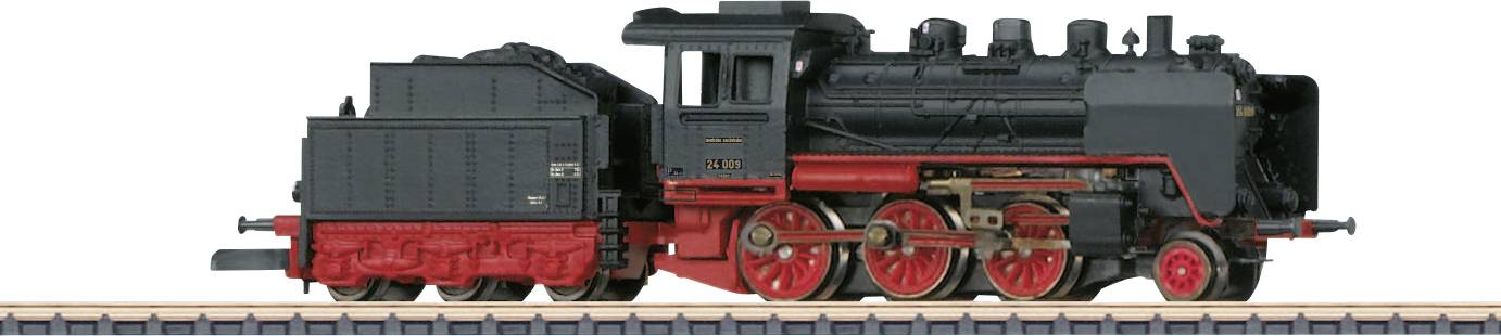 A black steam locomotive with a red chassis stands on a railway track, side view.