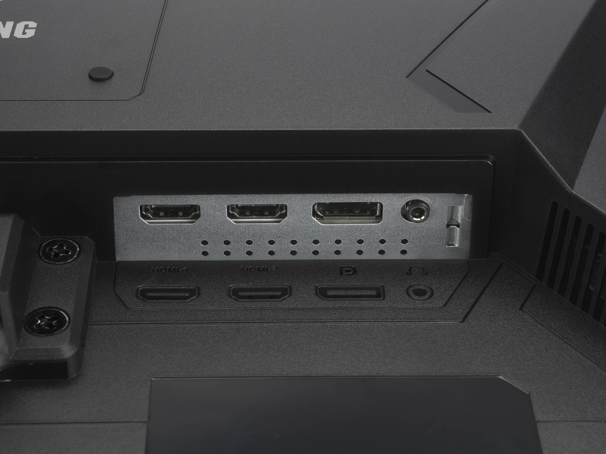 Back of a monitor with multiple ports: two HDMI and a DisplayPort in a metal-framed panel, alongside an audio socket.