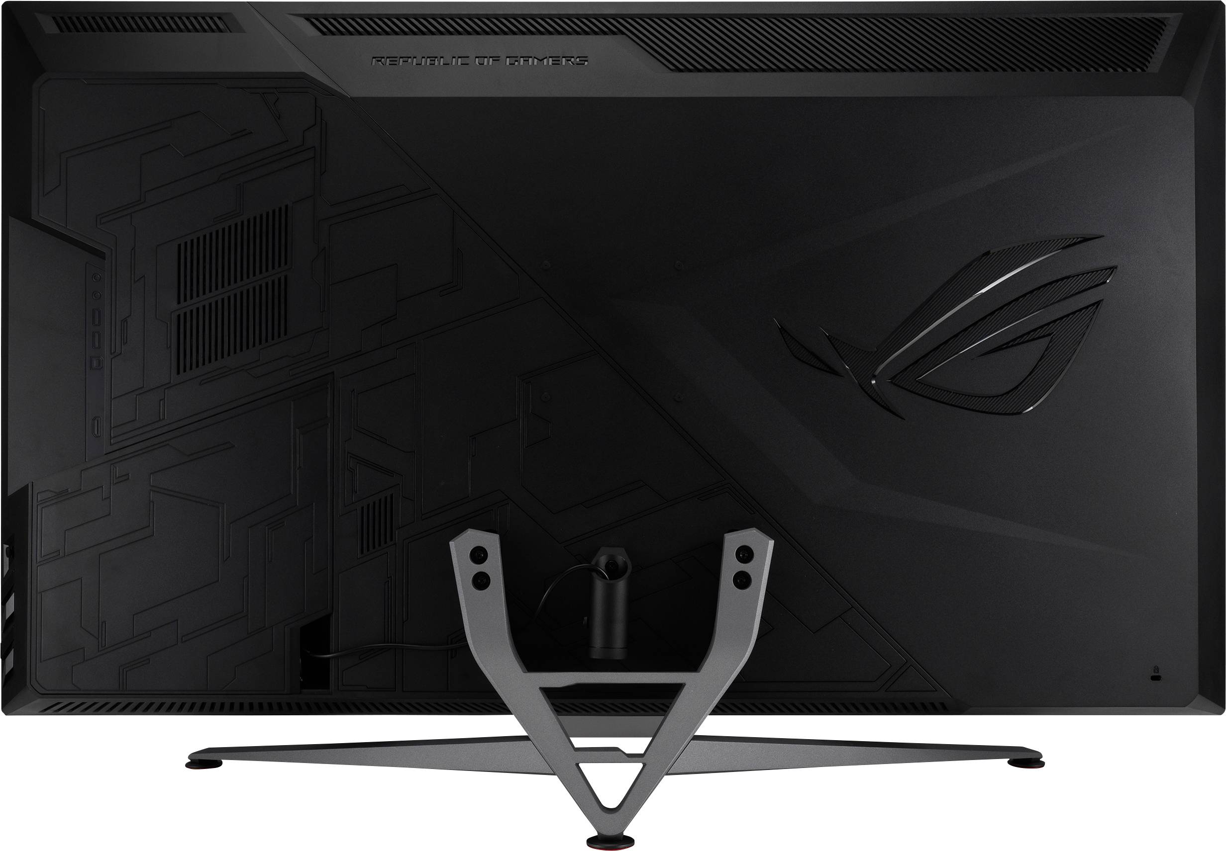 The rear view of a gaming monitor with a sturdy stand and an embossed logo on the right side.