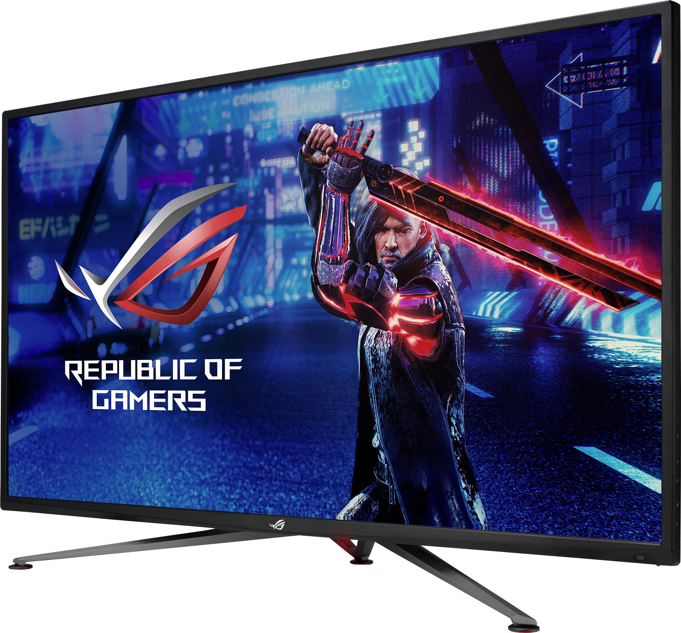 A gaming monitor displaying the inscription 'Republic of Gamers'. A futuristic warrior with a sword is visible in the background.