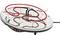 A silver electric heater with an oval shape and visible heating element. On/off button located on the front.