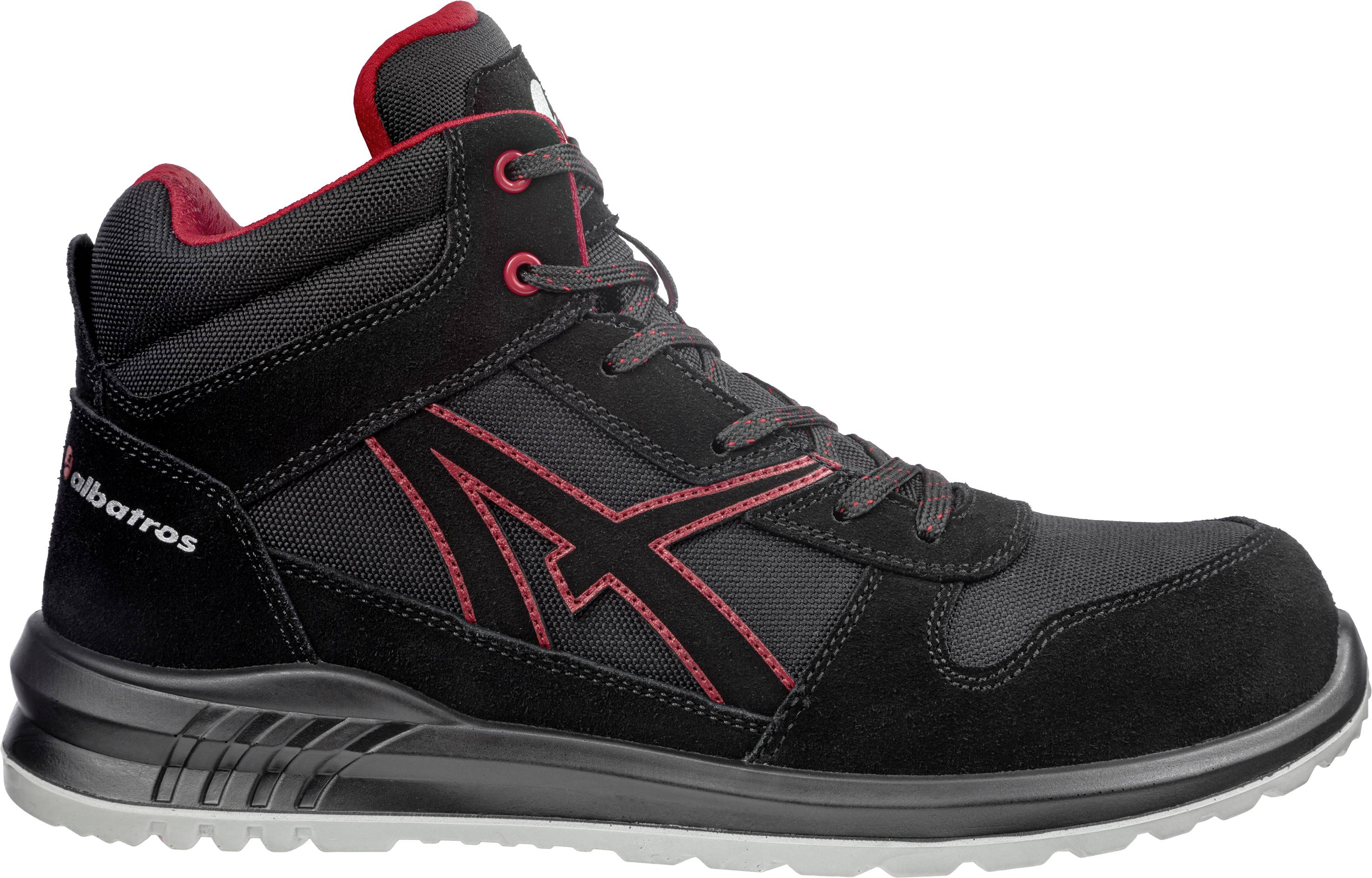High-cut black shoe with red accents. Sporty style, suitable for outdoor activities.