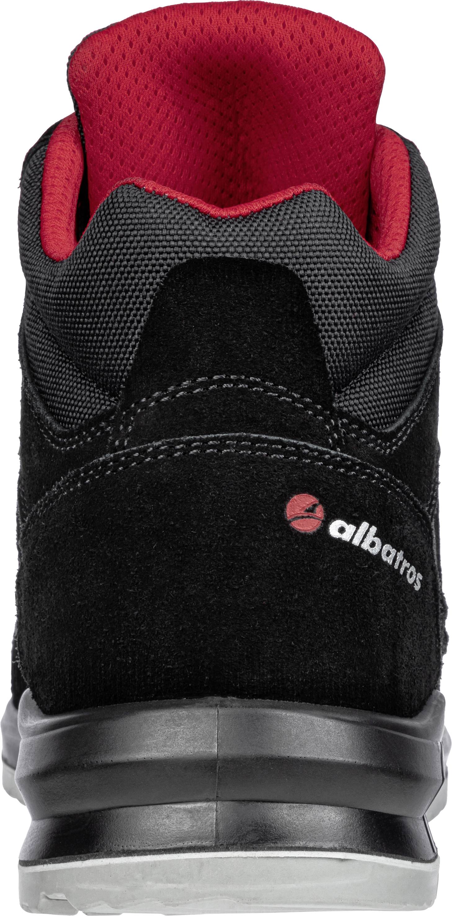 Black shoe from behind, with grey pattern and red inner lining. 'Albatros' brand in white and red on the heel.