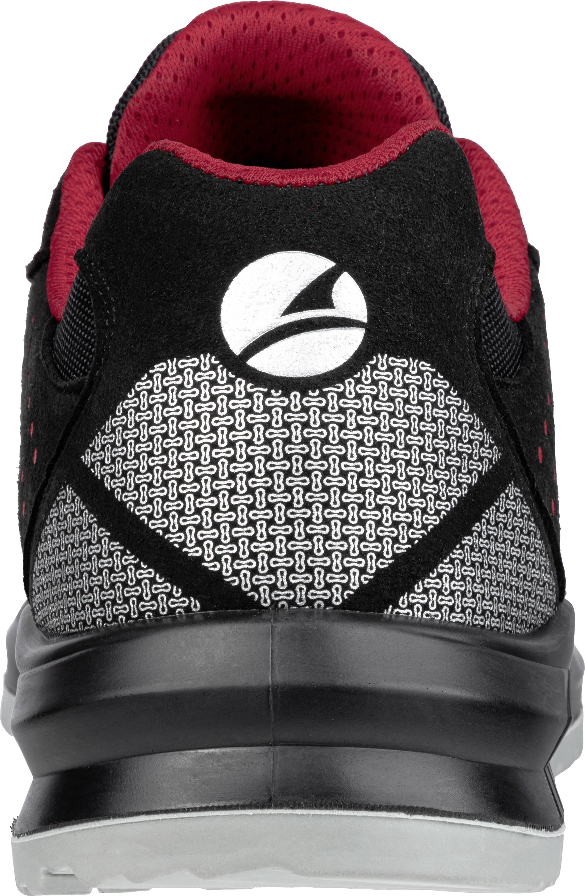 Black sports shoe with red inner lining and reflective pattern on the heel. The logo is white and centrally positioned.