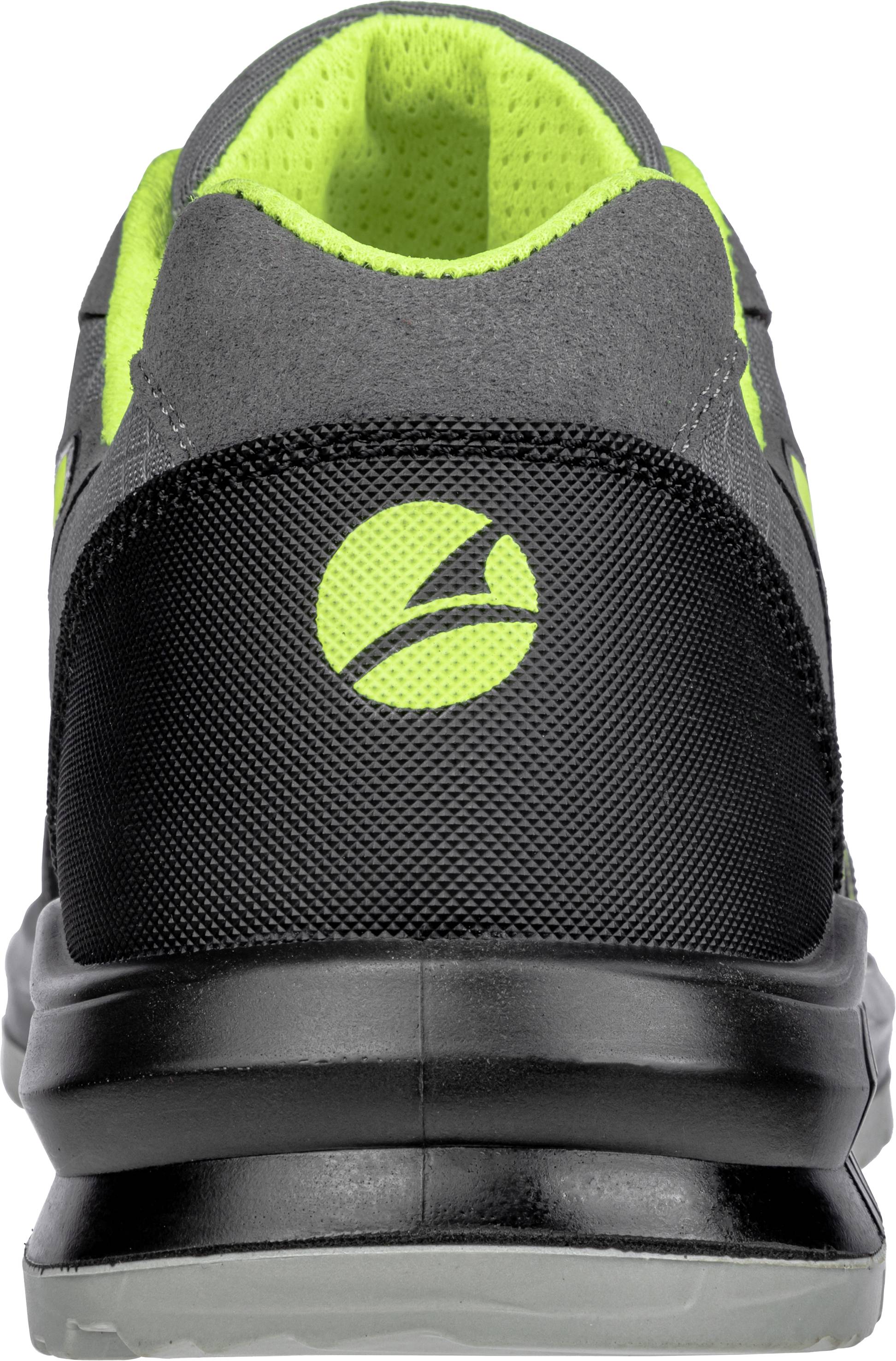 A grey sports trainer viewed from behind with a black heel and bright green accents.