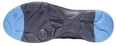 The sole of a sports trainer with blue reinforcements at the heel and toe. The tread pattern shows various shapes for slip resistance.