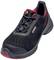 A black work shoe with red inner lining and sole, decorative lines on the sides, and a reinforced toe.