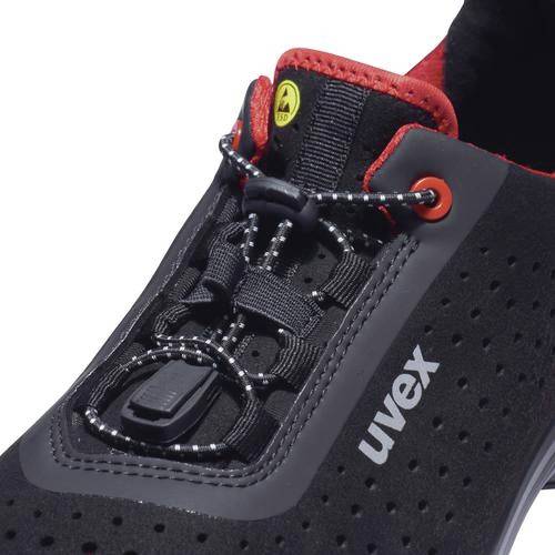 A black safety shoe with red accents and laces, printed with the 'uvex' logo on the side.