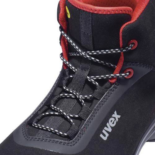 Black work shoe with red and black lace and red inner lining, with the 'uvex' logo on the side.