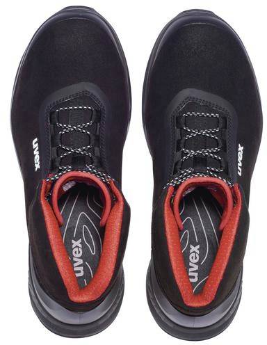 Black safety shoes with red inner linings and laces, viewed from above. Brand name 'uvex' visible on the insole.