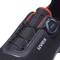 Sporty safety shoe in black with red detail and twist fastening. Brand name 'uvex' visible on the side.