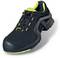 Black safety shoe with yellow accents and a non-slip sole, suitable for workplace protection.