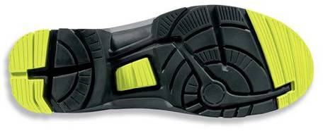 Black shoe sole with yellow non-slip inserts, displaying tread pattern to improve grip on smooth surfaces.