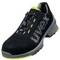 Black safety shoe with silver 'uvex' logo, yellow details and lace-up fastening.