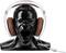 A black bust with an open mouth, wearing headphones with brown ear cushions.