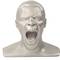 A silver bust of a male face with mouth wide open, as if he is shouting or yawning.